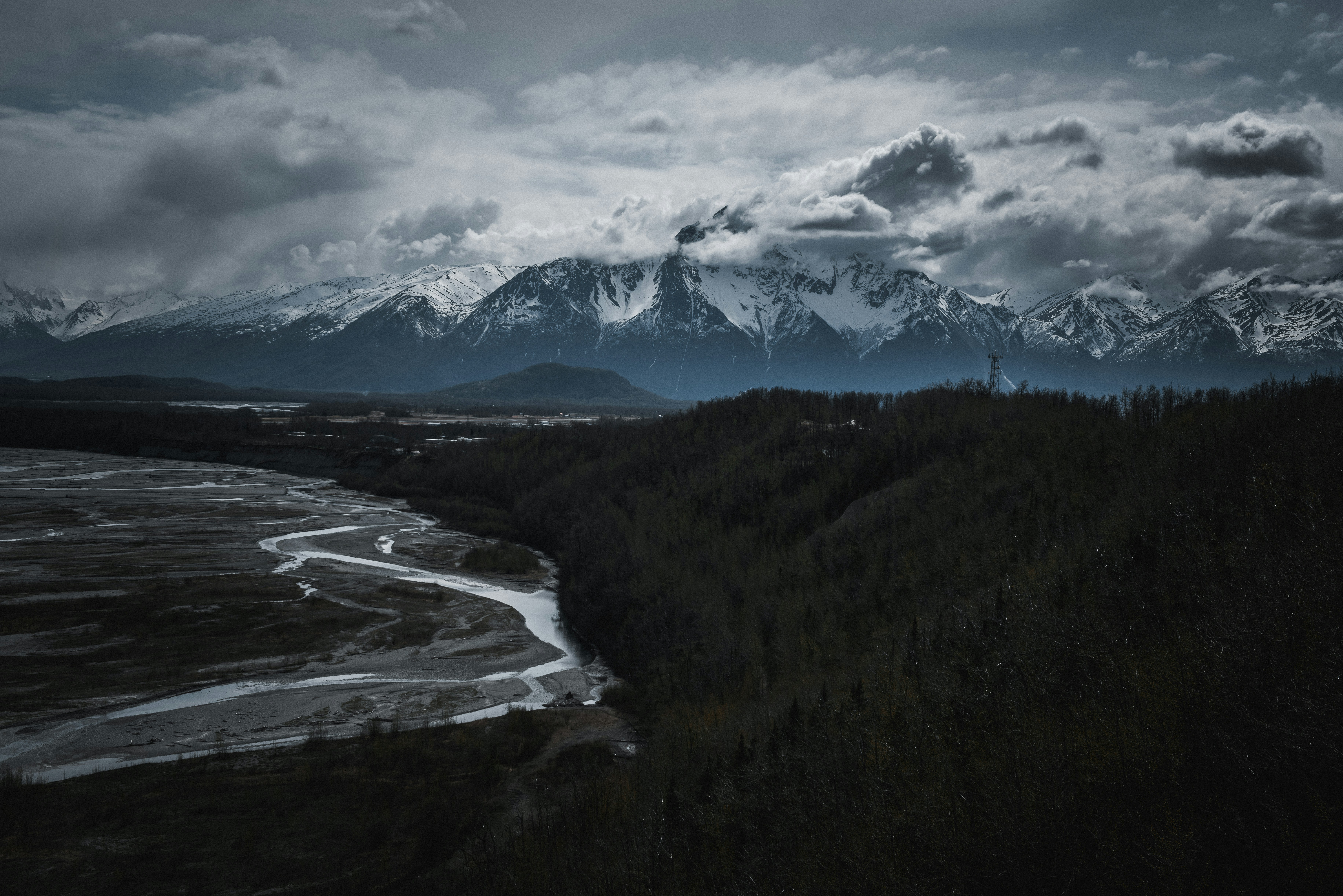 A black and white photo of a mountain range
