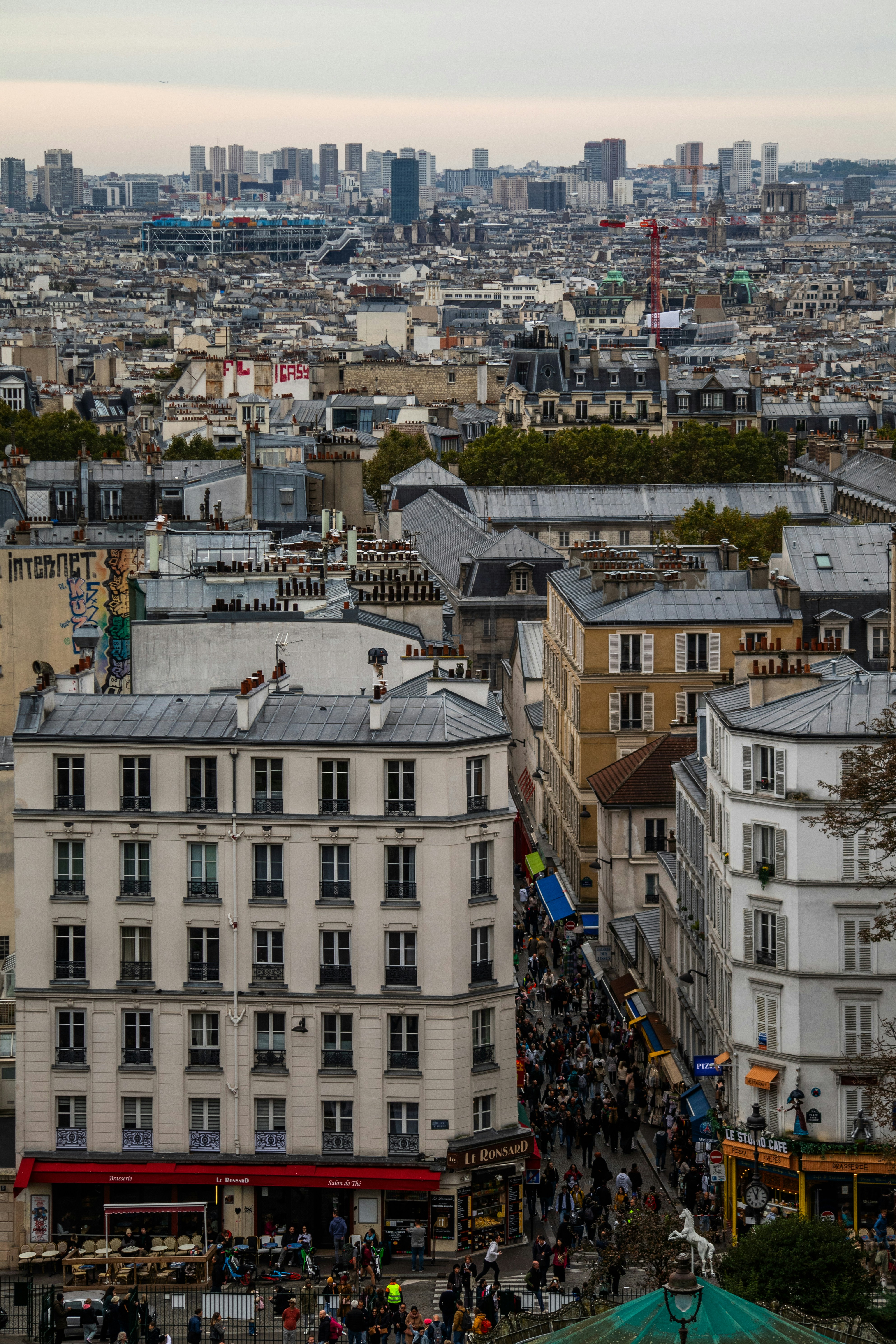 A view of a city from the top of a building