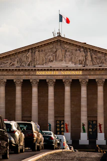 A large building with a flag on top of it