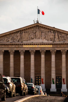 A large building with a flag on top of it
