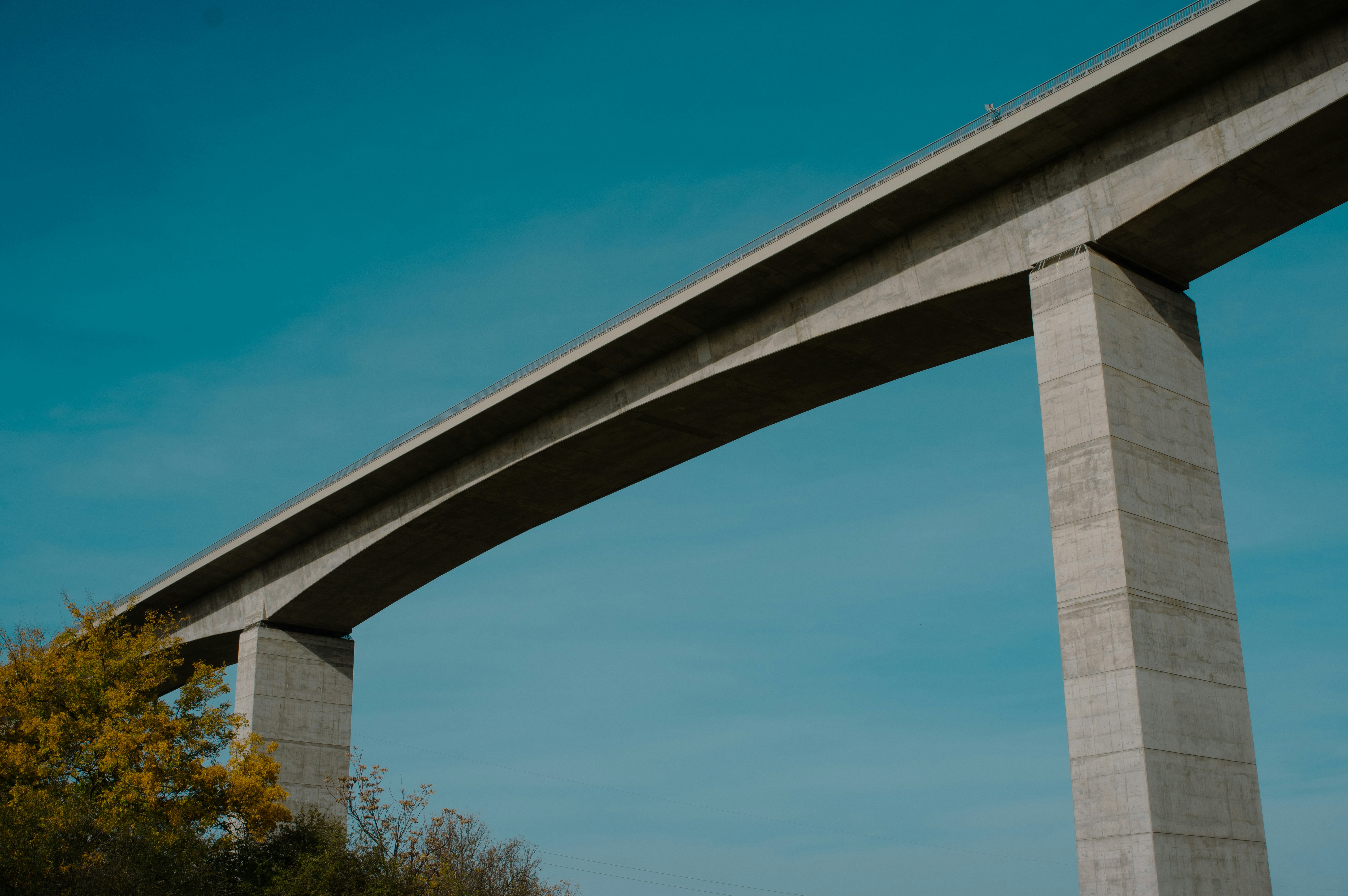 A view of a bridge from the side of the road