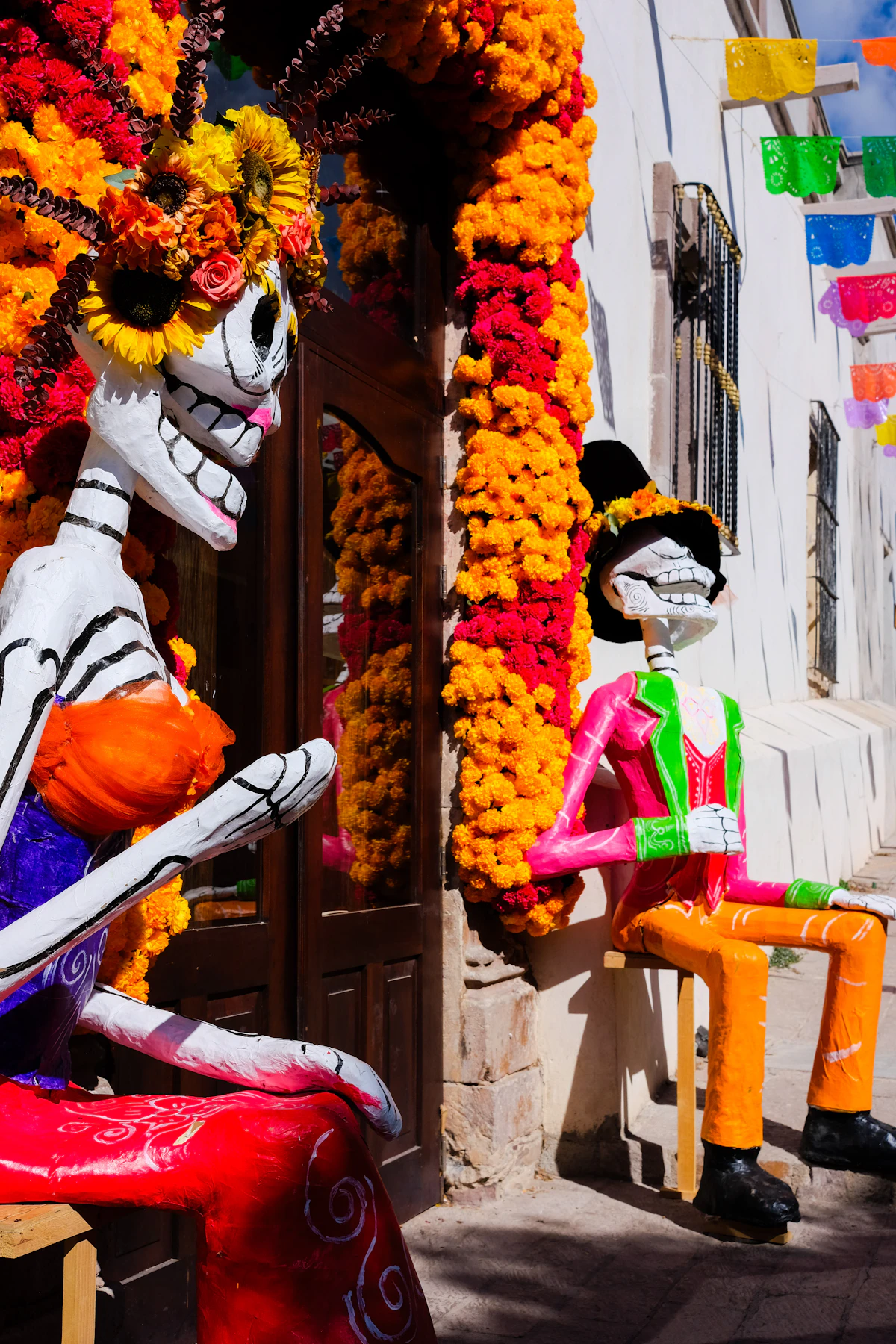 Sugar skulls and pan de muerto at Day of the Dead market
