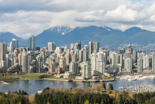 A view of a city with mountains in the background — Vancouver, Canada