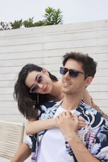 A man holding a woman in his arms