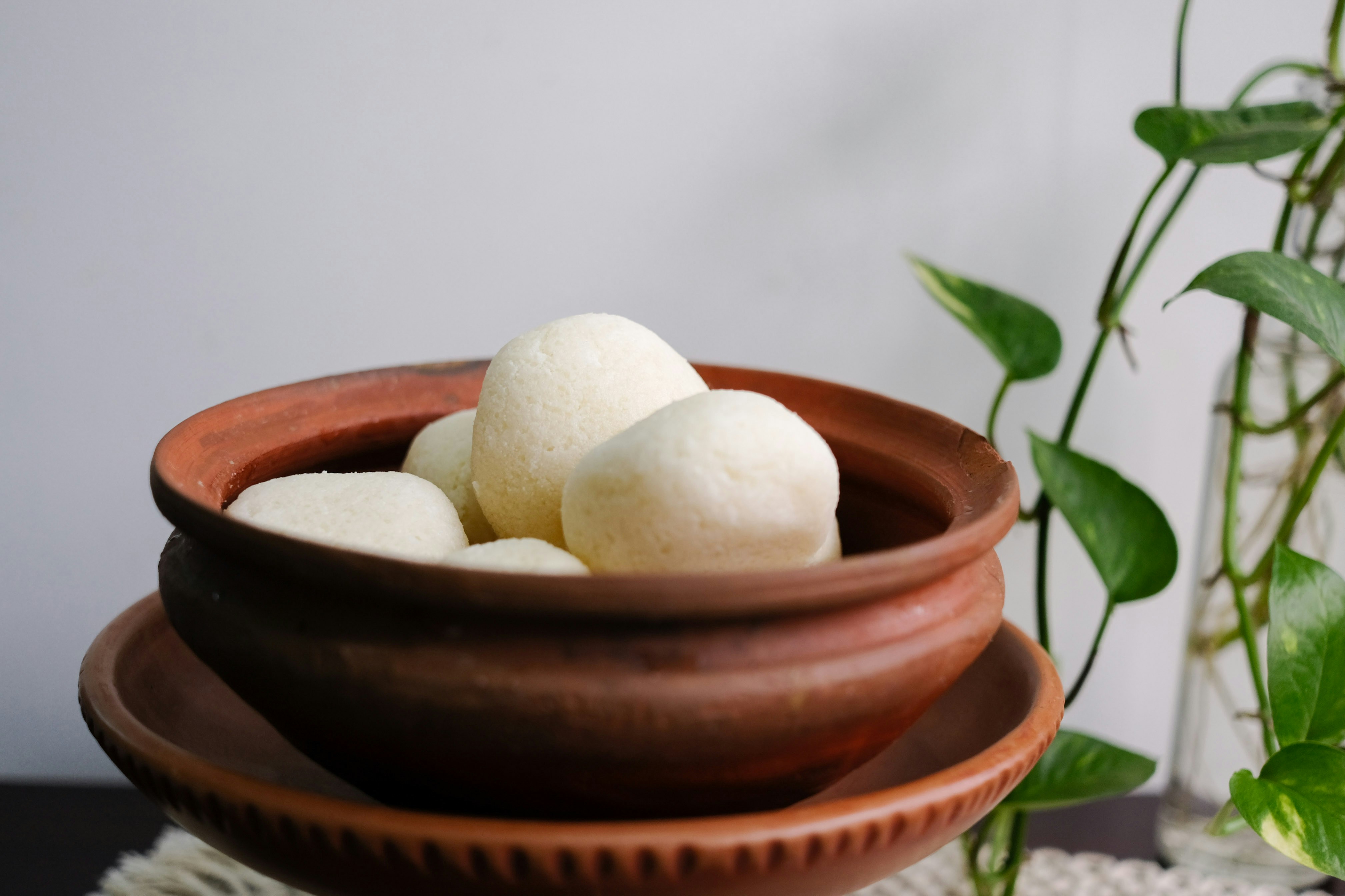 woman wearing yellow long-sleeved dress under white clouds and blue sky during daytime