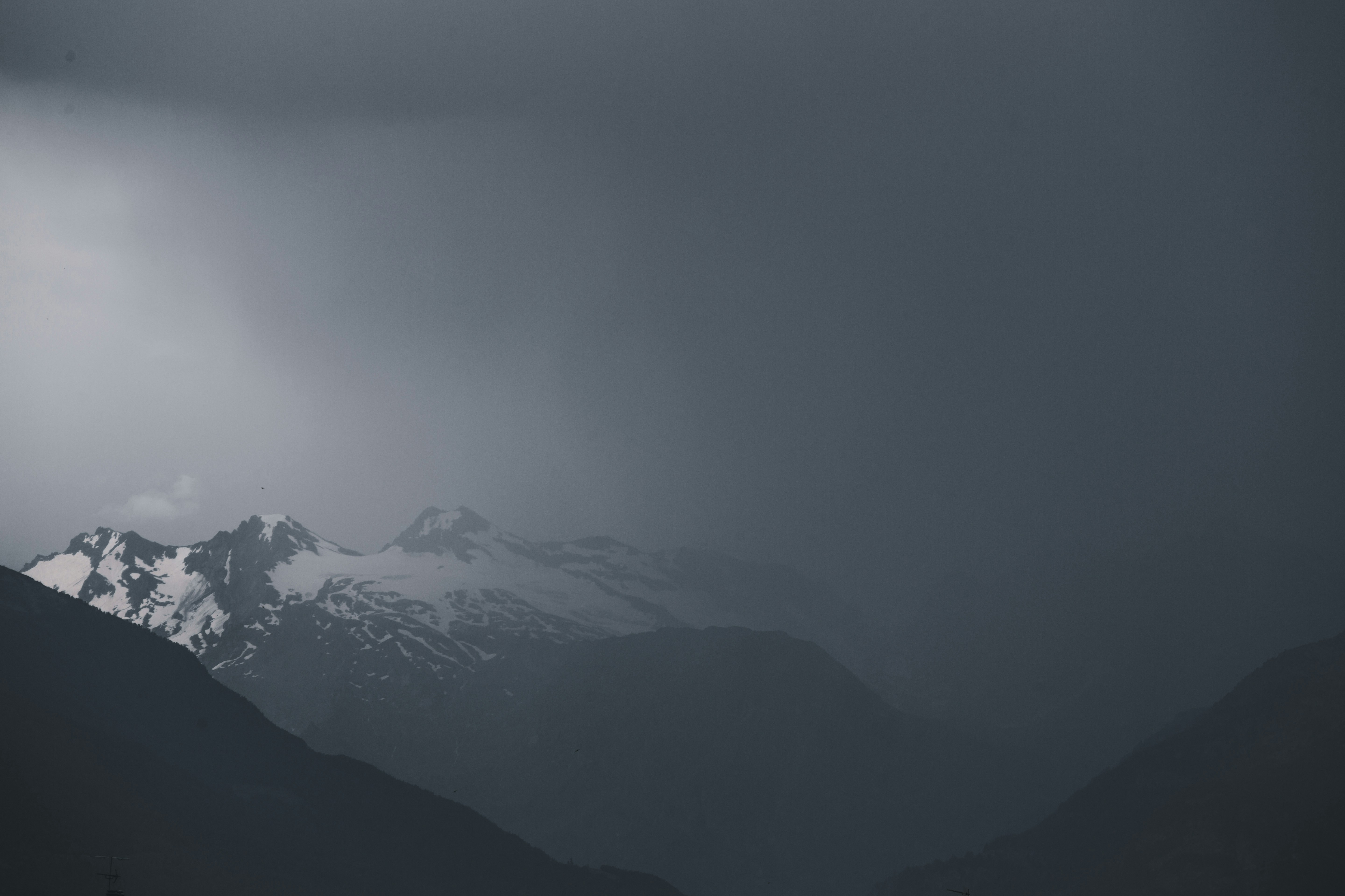 A black and white photo of a mountain range