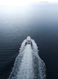 A boat traveling across a large body of water