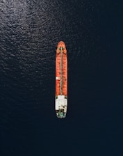 An aerial view of a cargo ship in the ocean