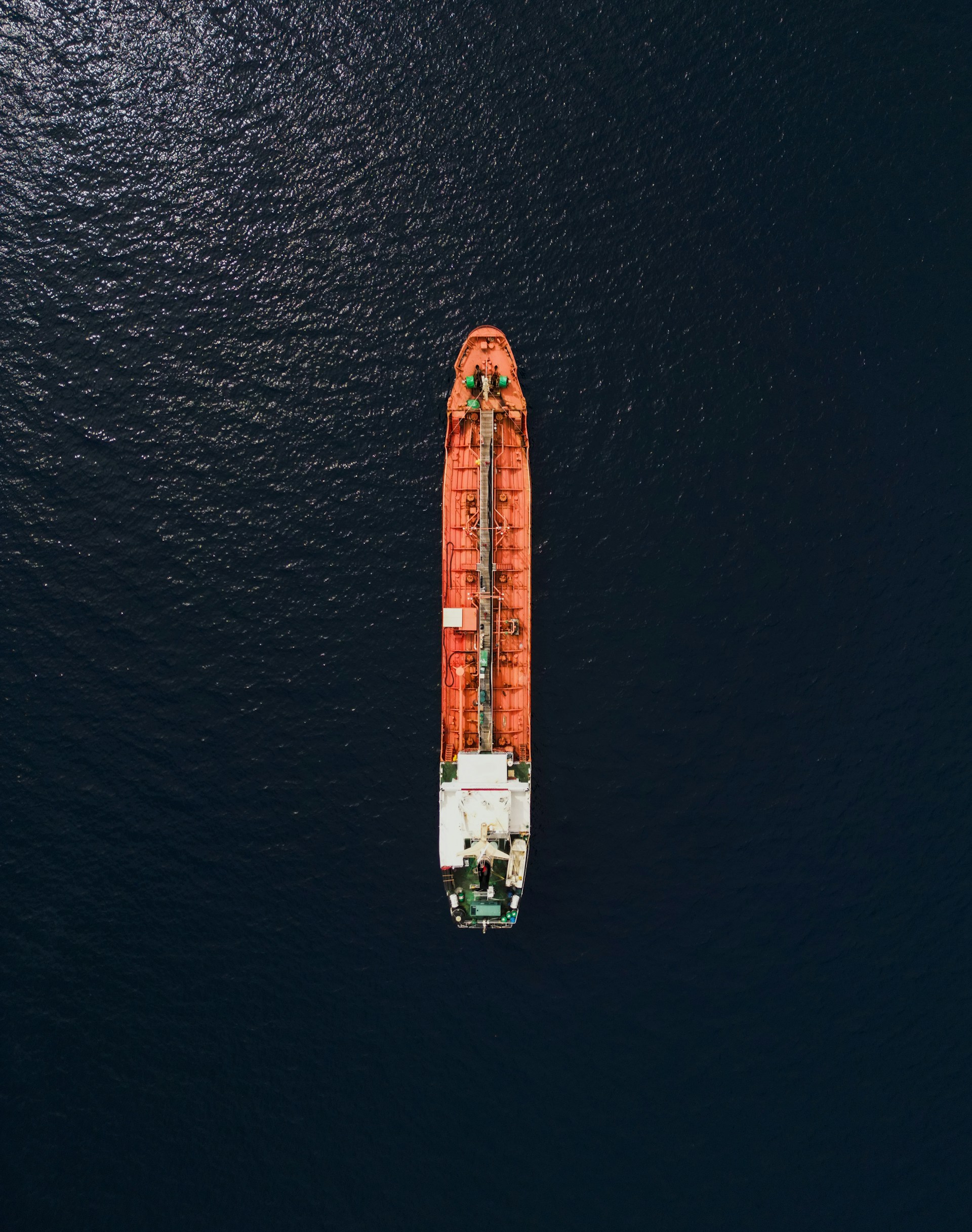 An aerial view of a cargo ship in the ocean