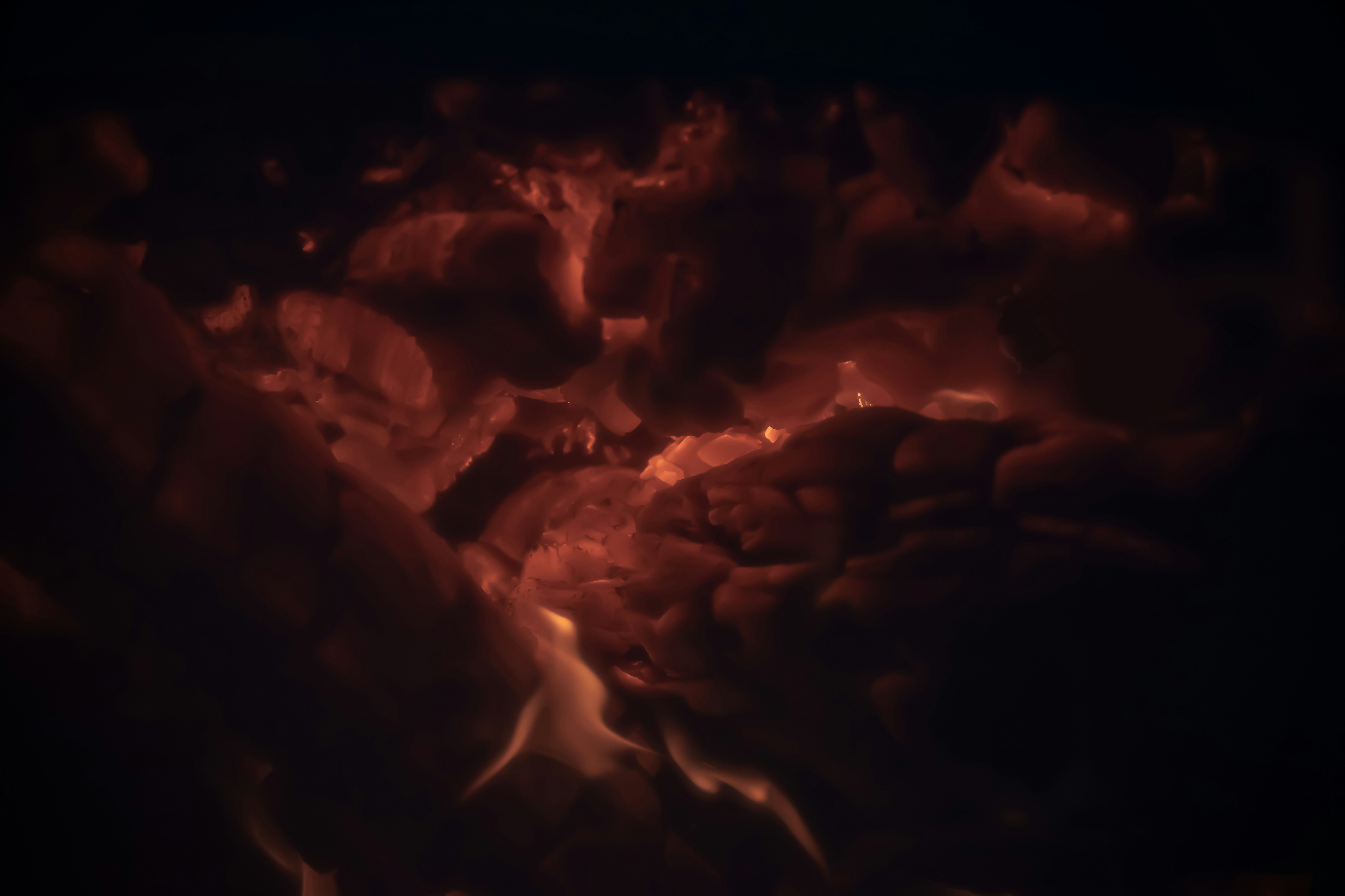 A close up of a fire in a fireplace