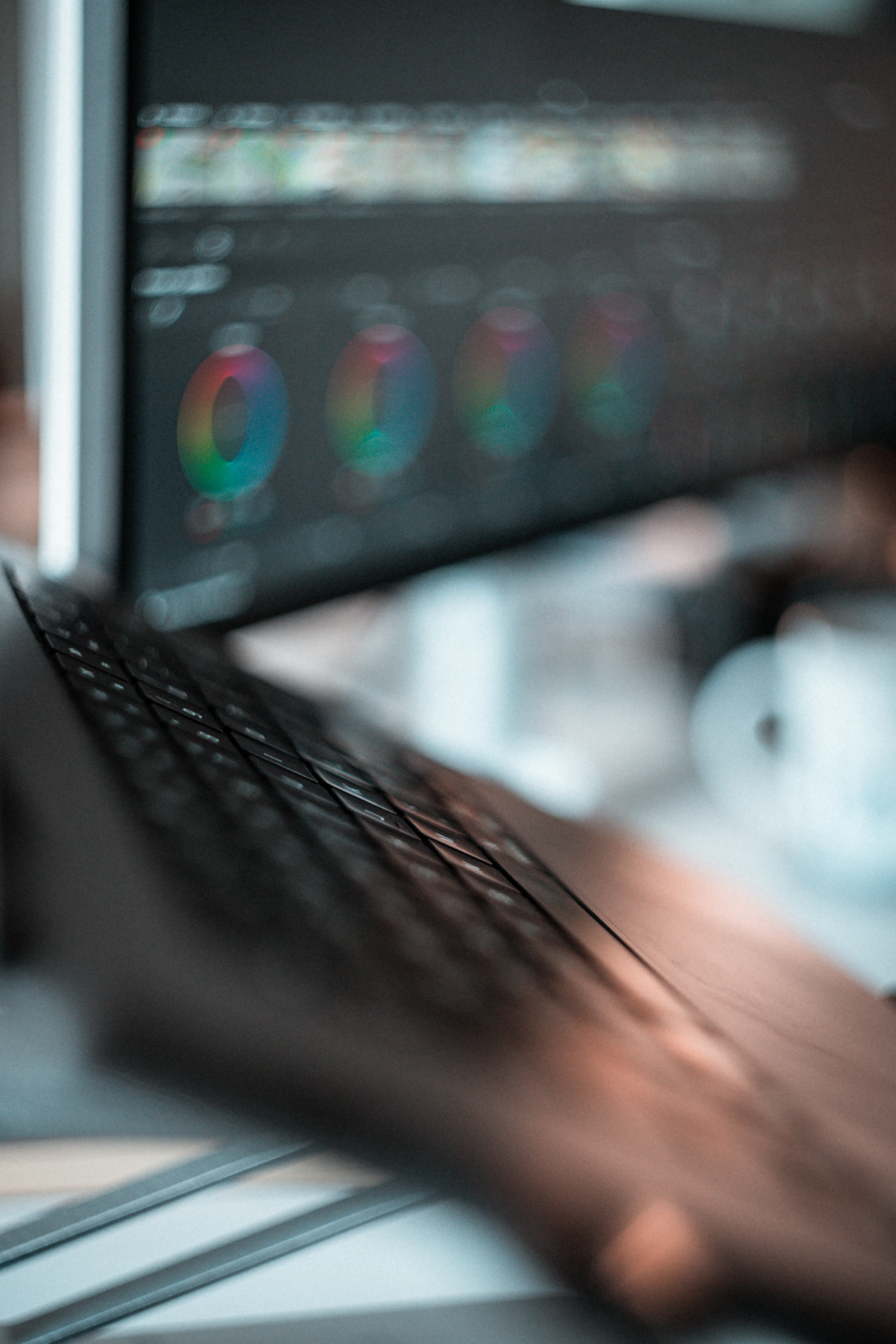 A close up of a computer keyboard and monitor