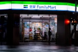 A family mart store lit up at night
