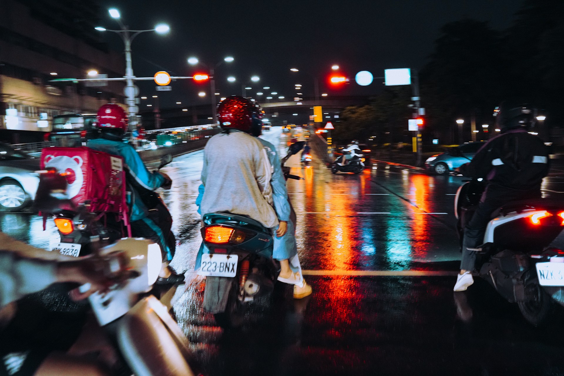 A couple of people that are standing in the street