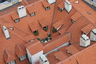 An aerial view of a red tiled roof