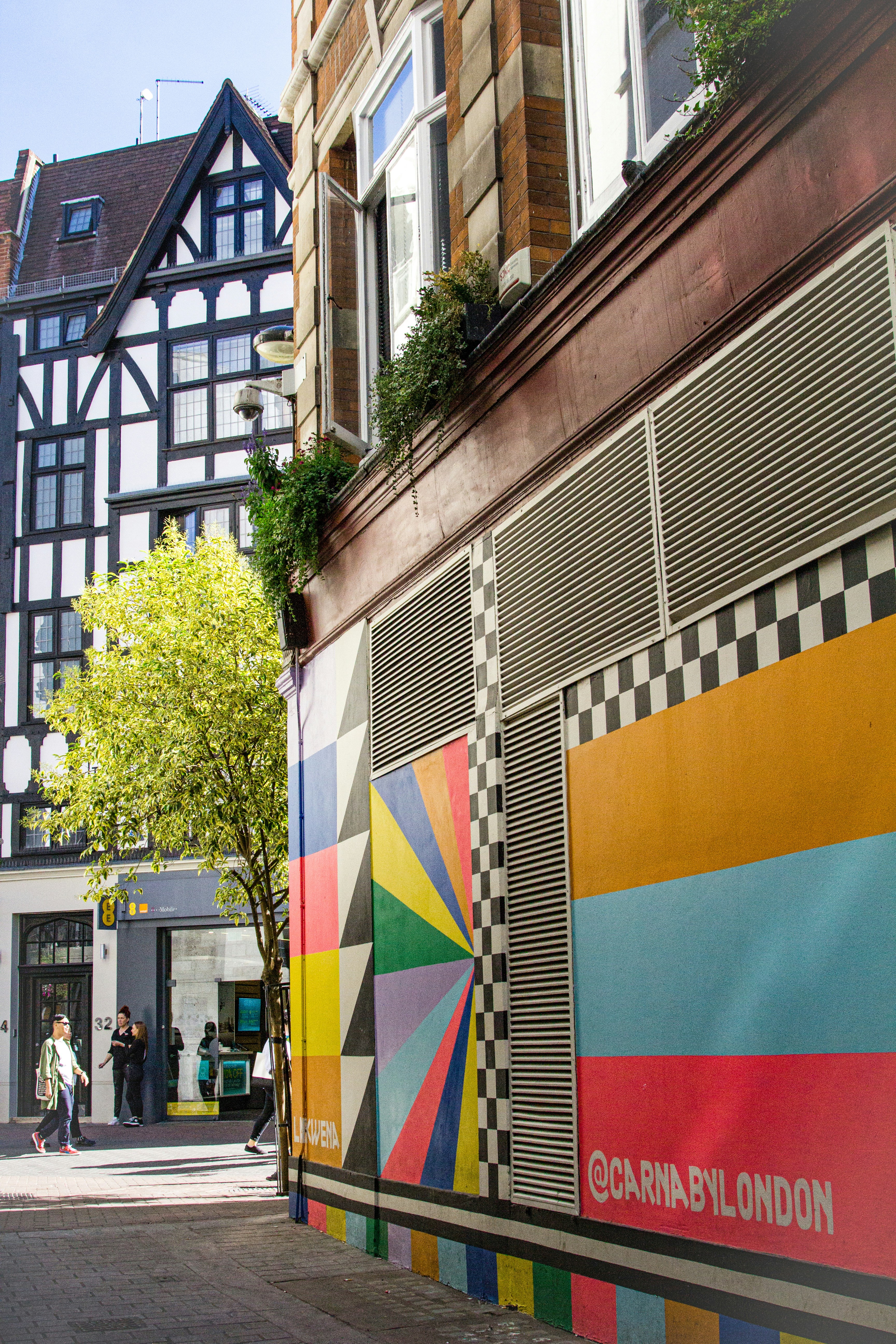 A building with a mural on the side of it