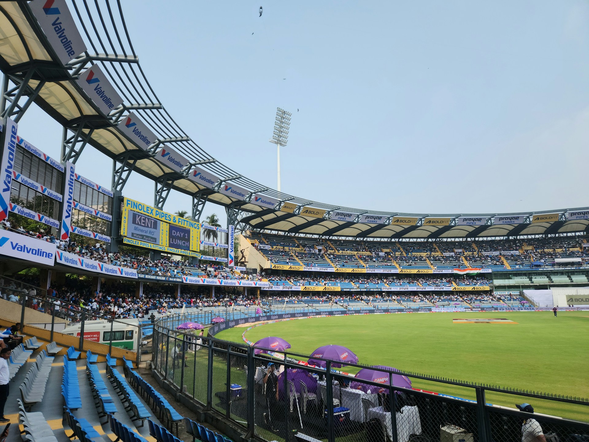 A baseball stadium filled with lots of people
