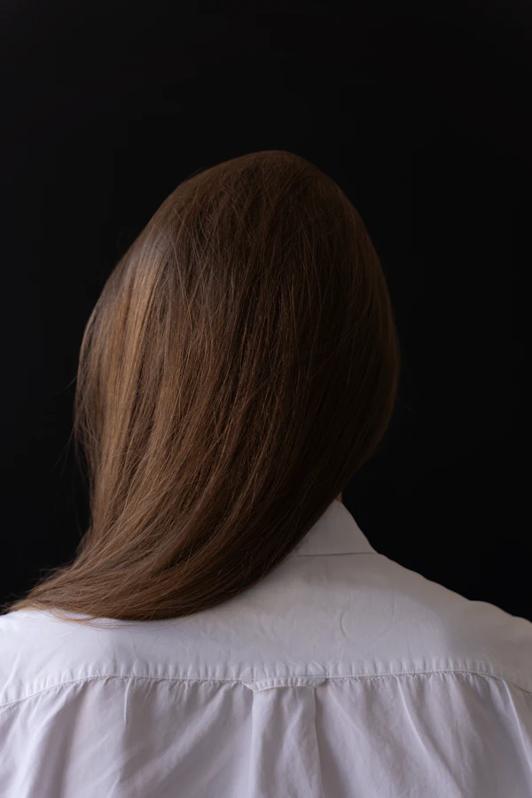 Before: straight, flat long hair without volume