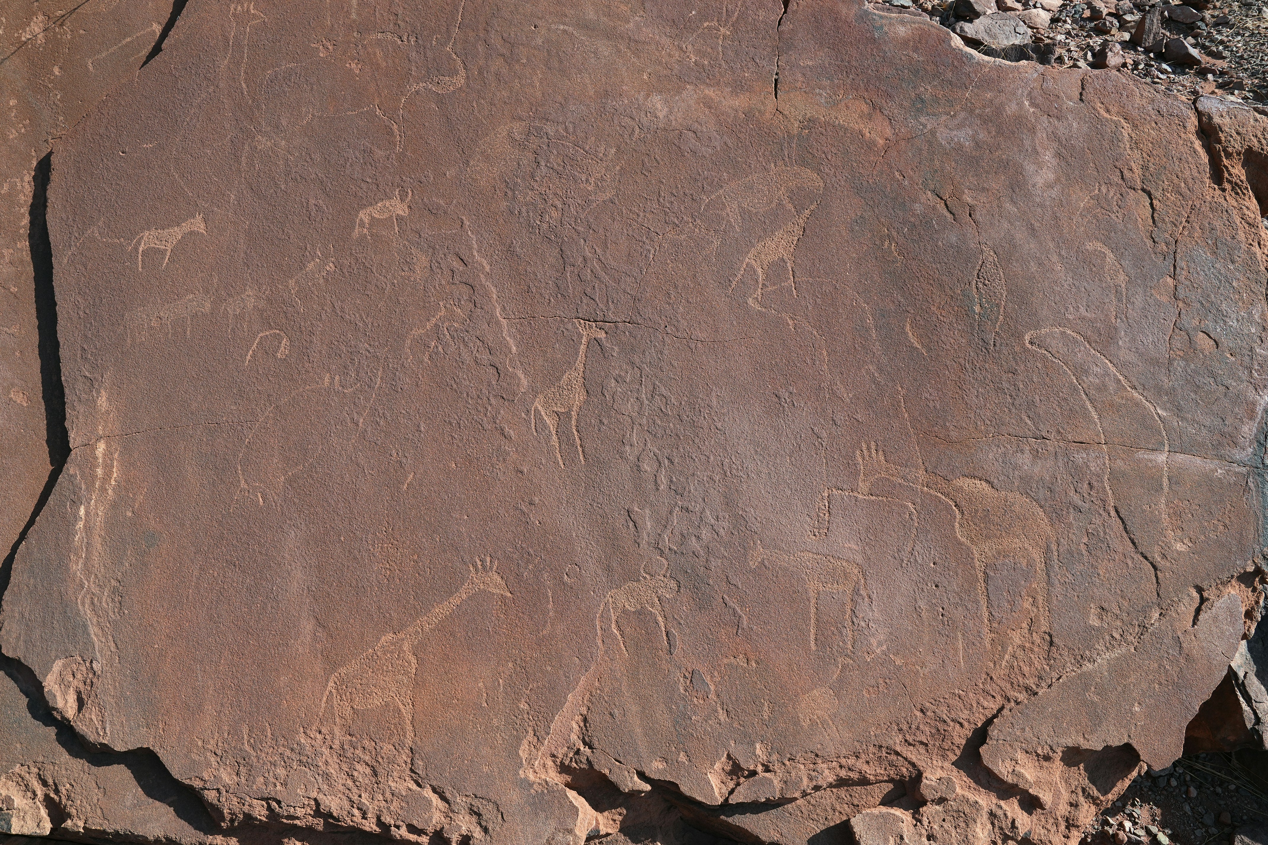 A large rock with some writing on it