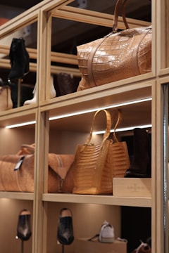 A display of handbags and purses in a store
