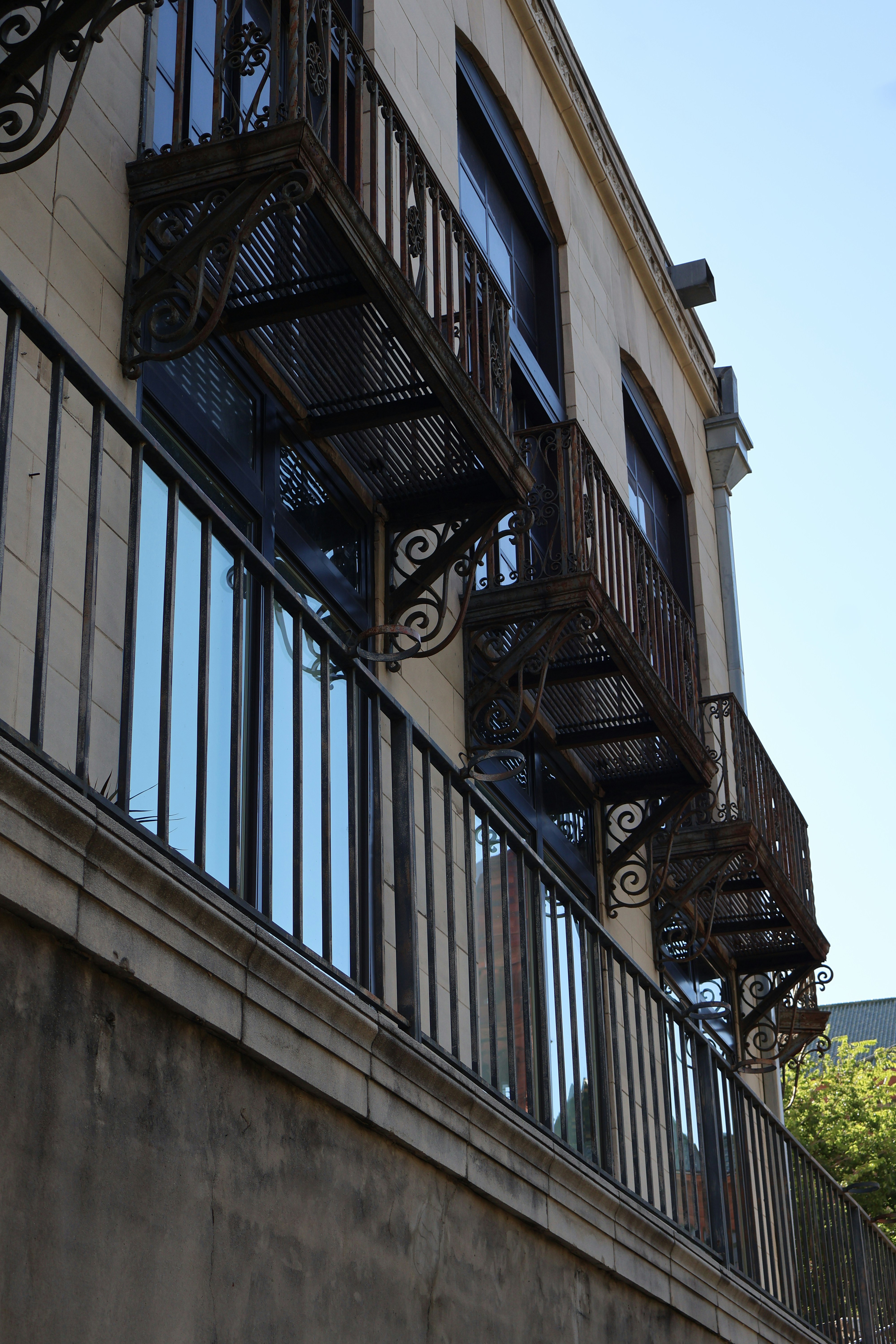 A building with a balcony and a fire escape