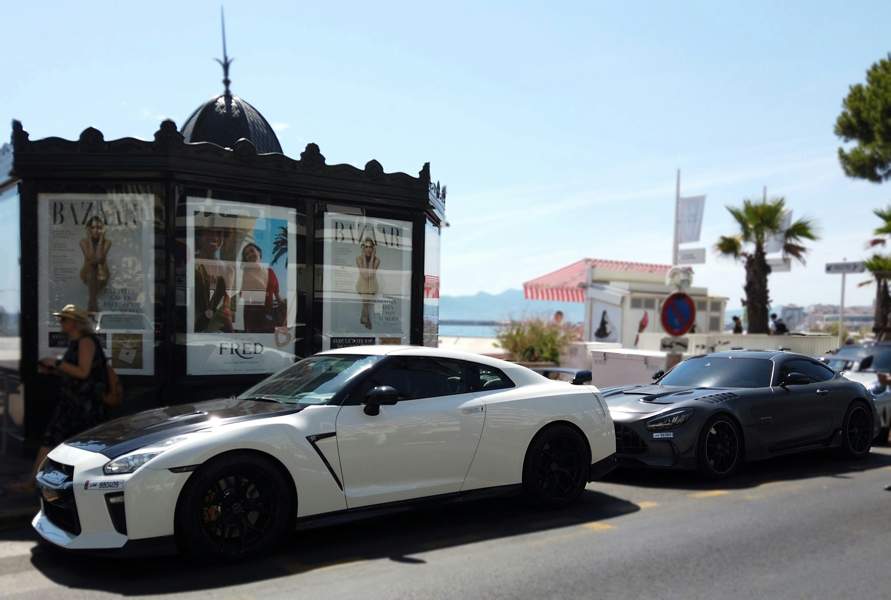 Wide exterior view of Tesla Gigafactory Texas with large main building and parking area