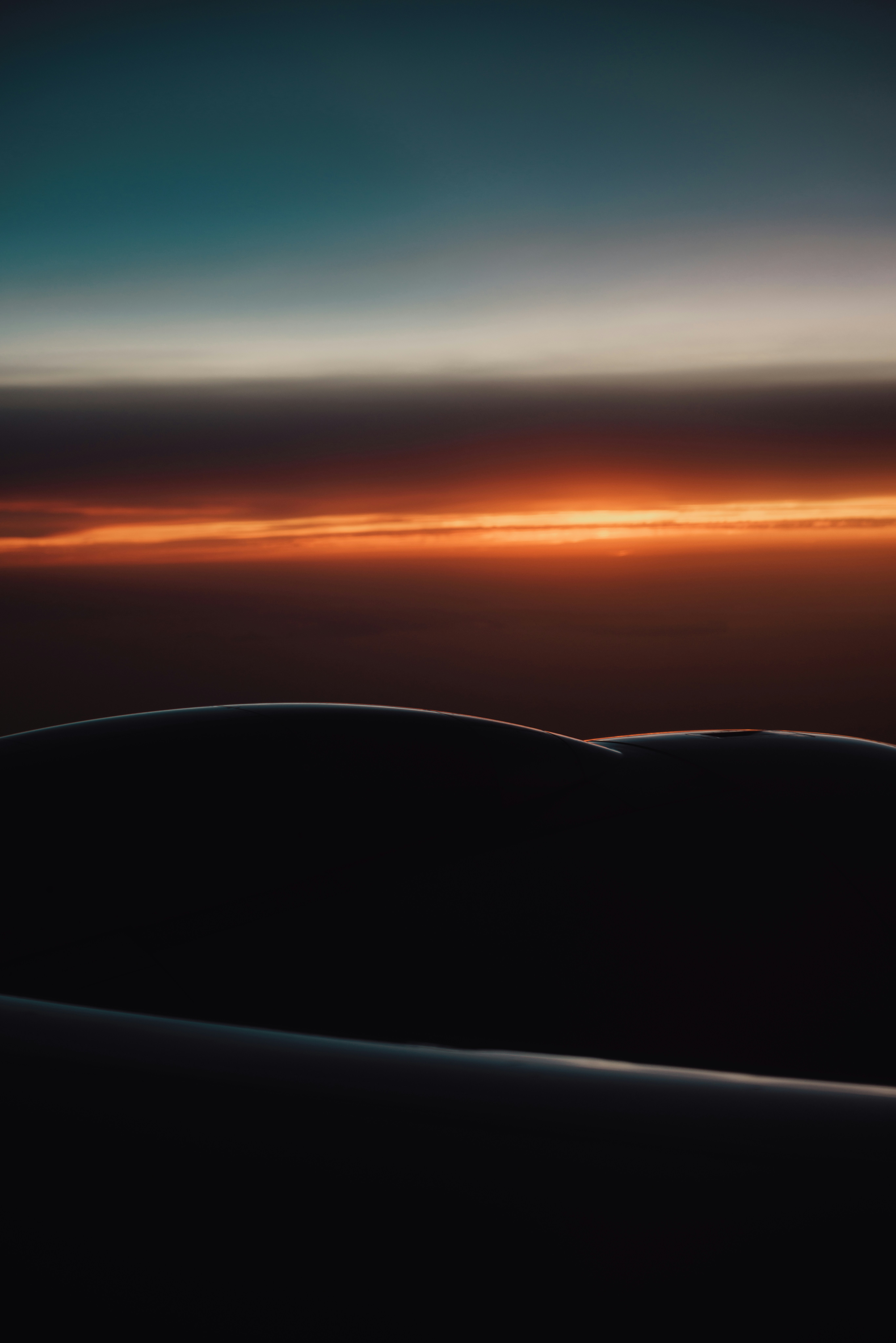A view of a sunset from an airplane
