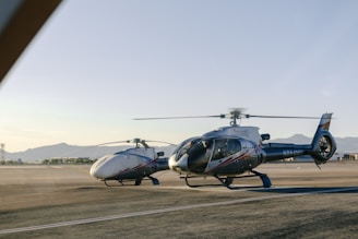 A helicopter sitting on top of an airport tarmac