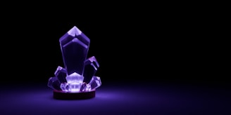 A purple crystal on a black background