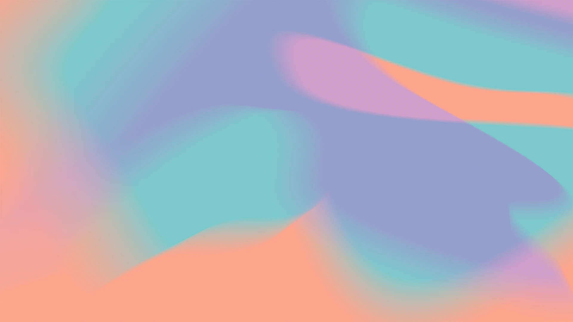 A blurry image of a pink and blue background