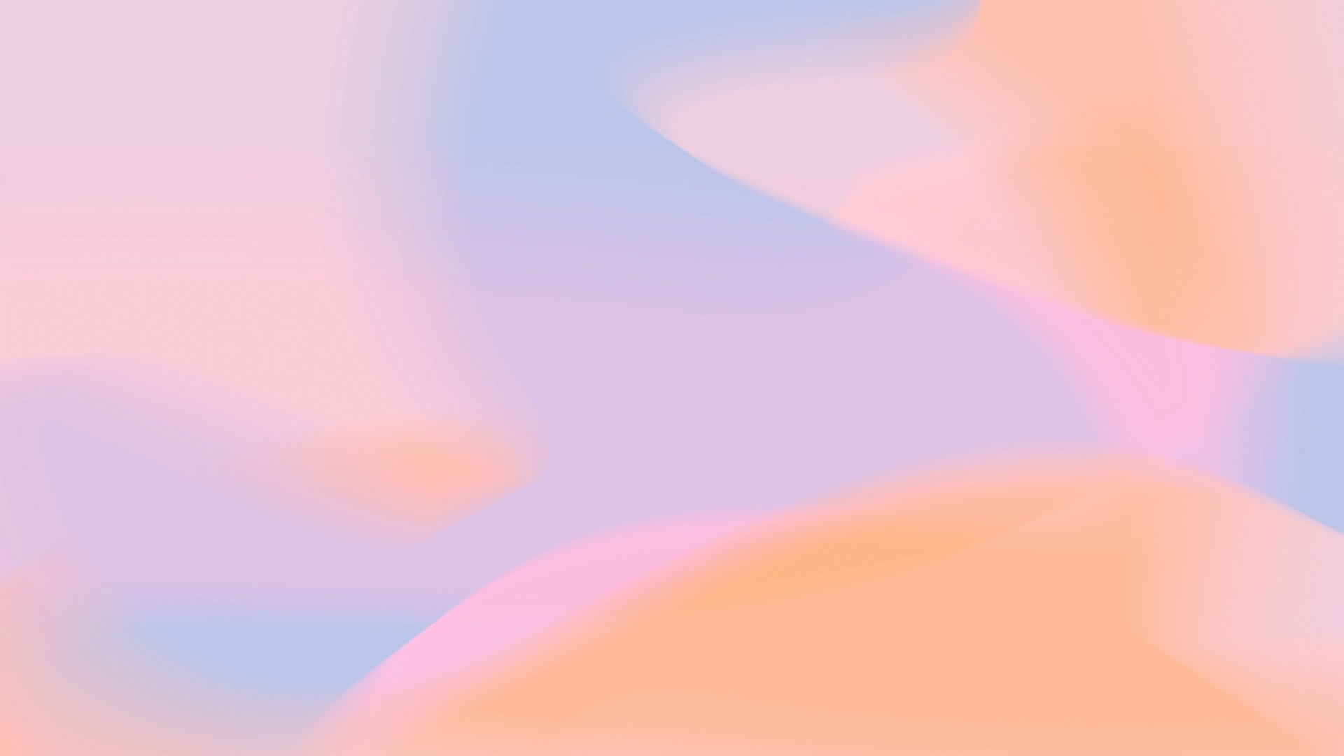 A blurry image of a pink and blue background