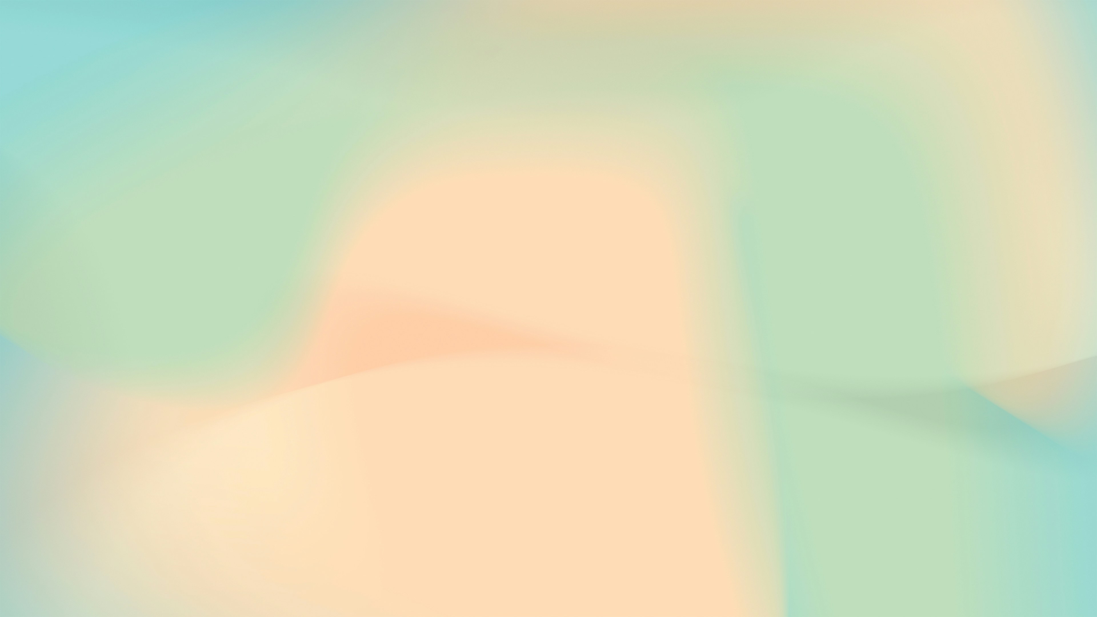 A blurry image of a blue and green background