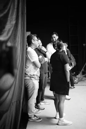 A black and white photo of a group of people