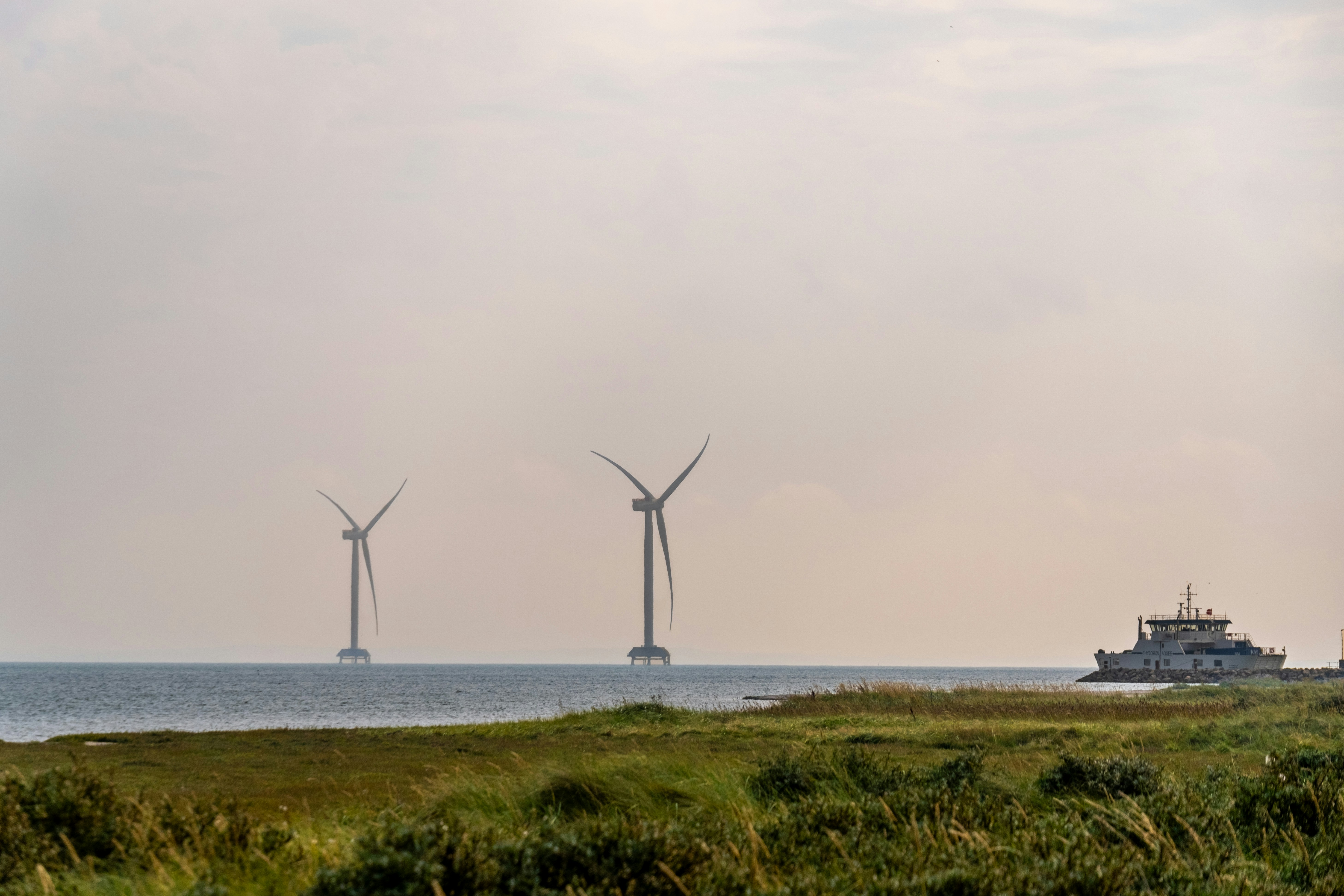 Wind turbines in coastal landscape at Thy National Park Denmark