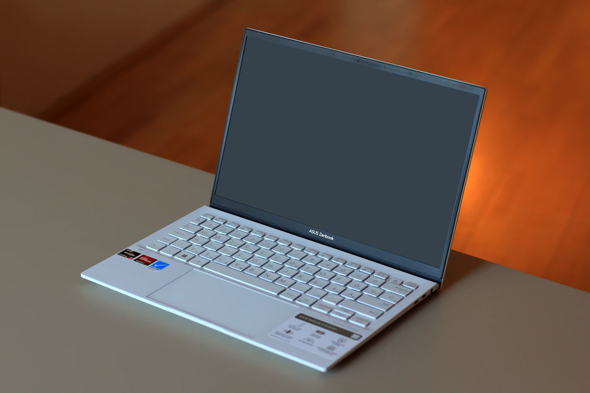 A laptop computer sitting on top of a table