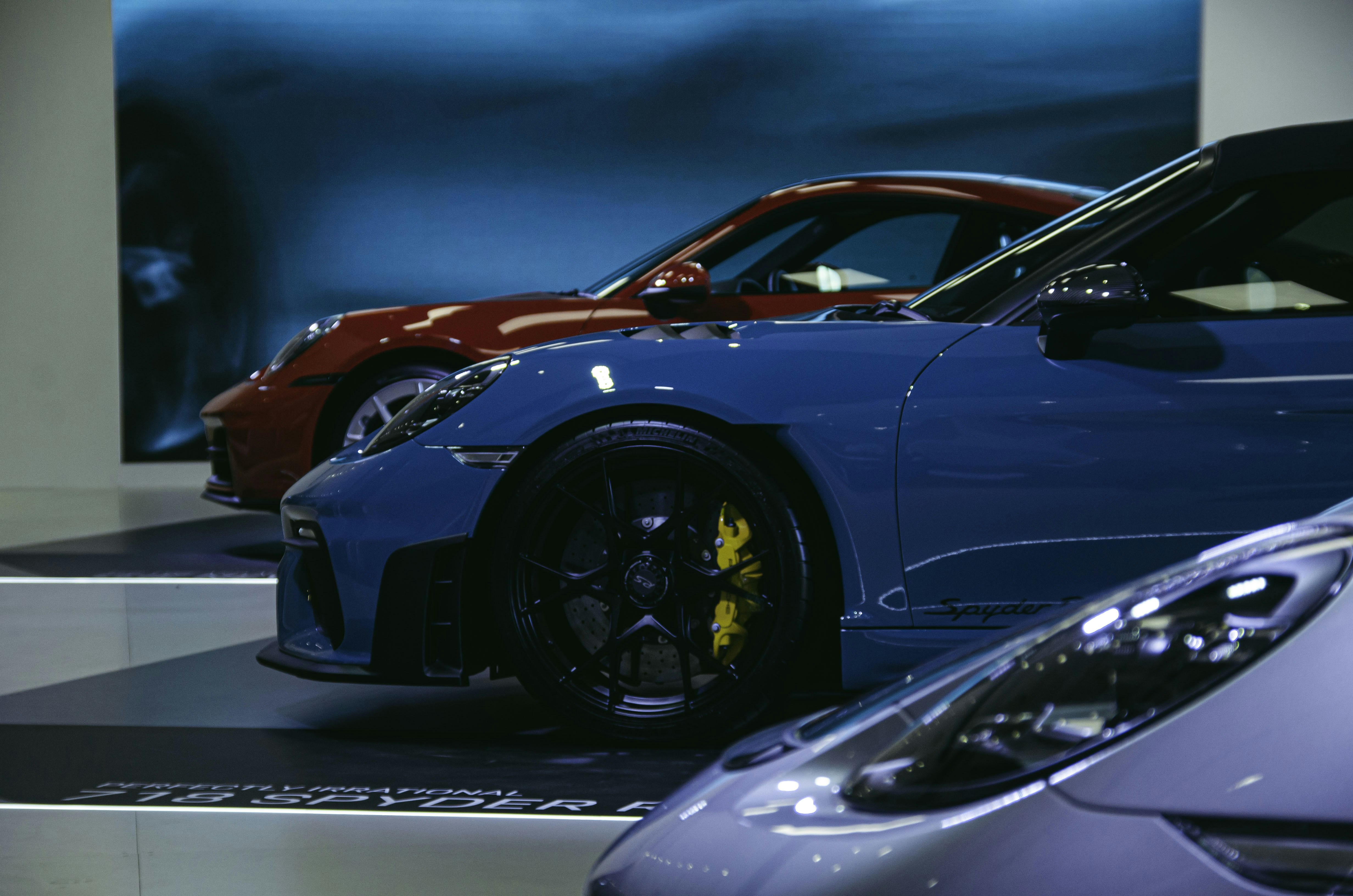 A bunch of cars that are on display