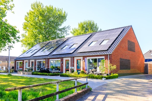 A house with a lot of solar panels on the roof