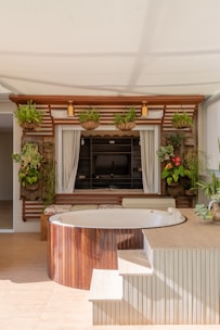 A living room filled with furniture and a fire place