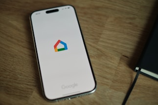 A close up of a cell phone on a table