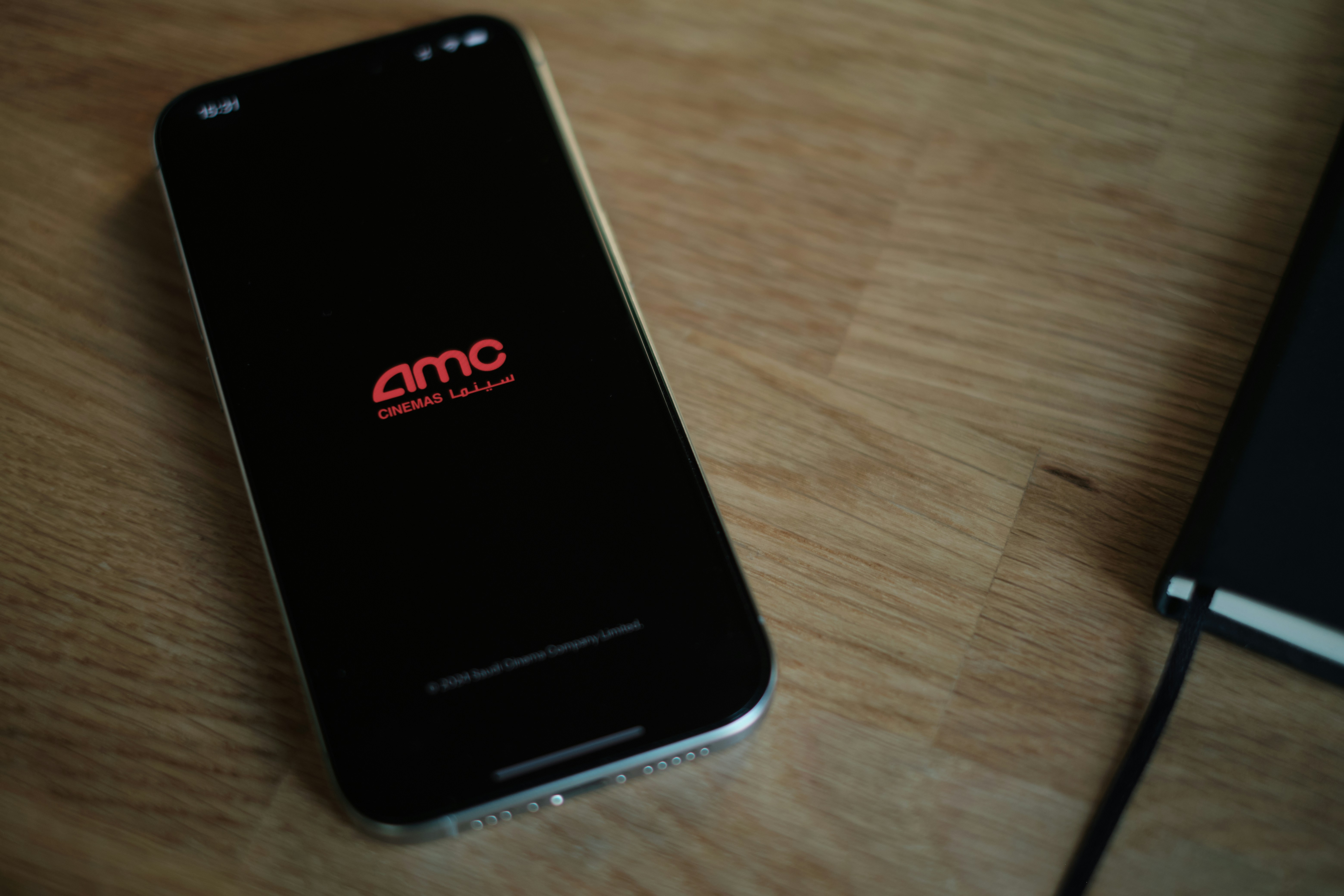 Cell Phone on Wooden Table