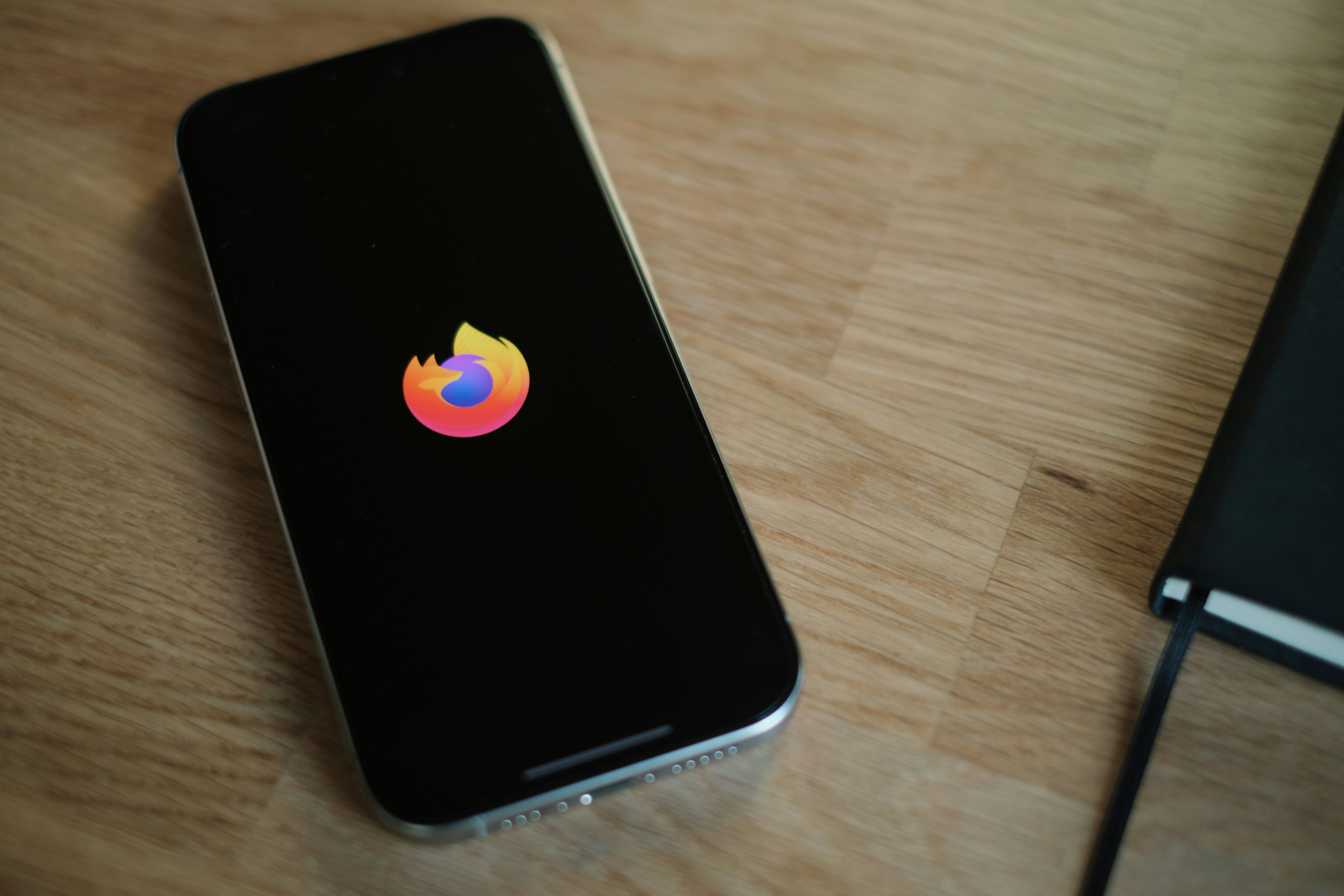 A close up of a cell phone on a table