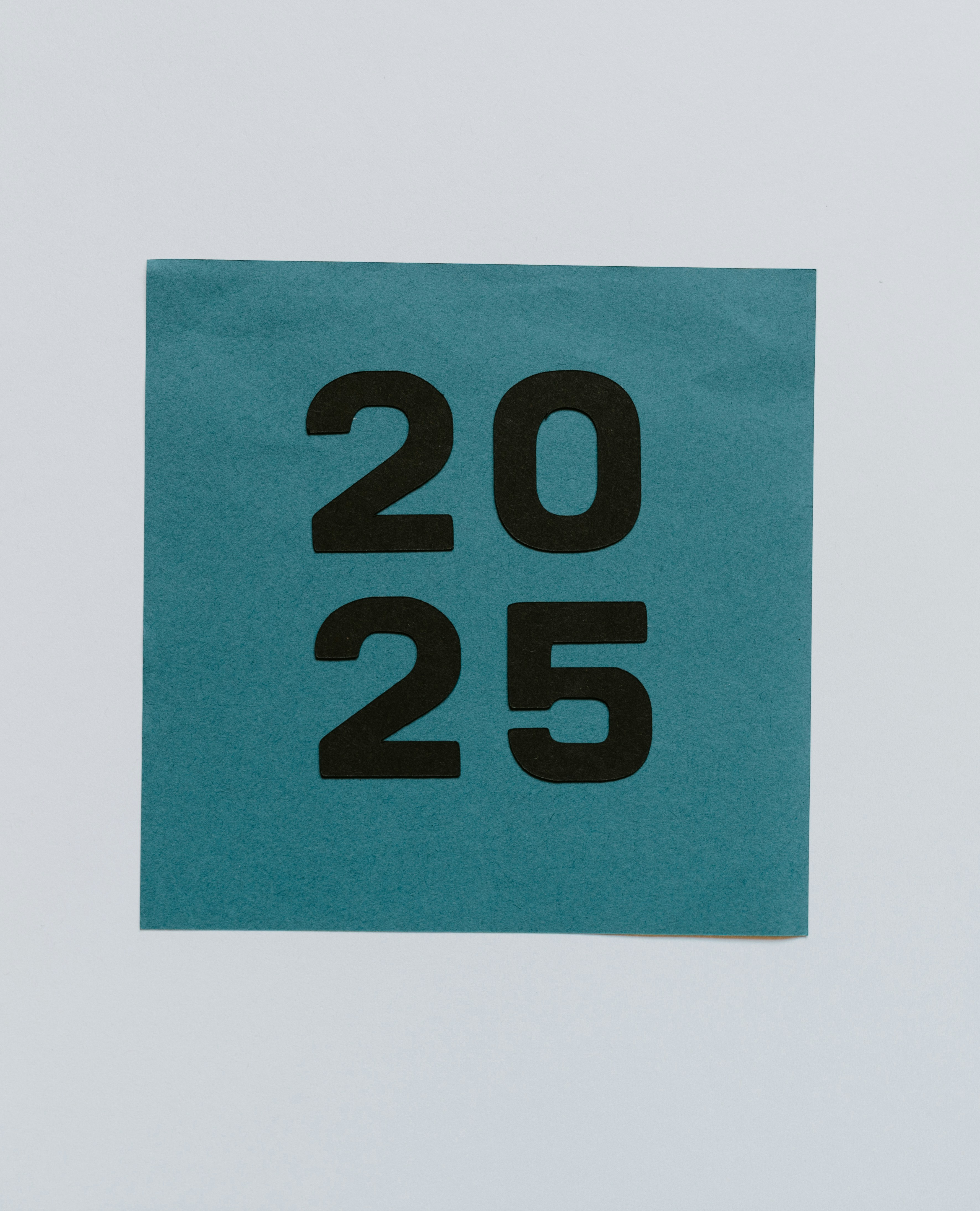 Image of a colorful 2025 calendar template with notes and reminders