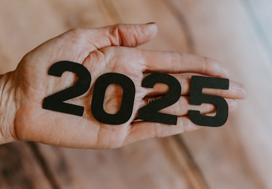 A person's hand holding the number twenty twenty twenty twenty twenty twenty twenty twenty
