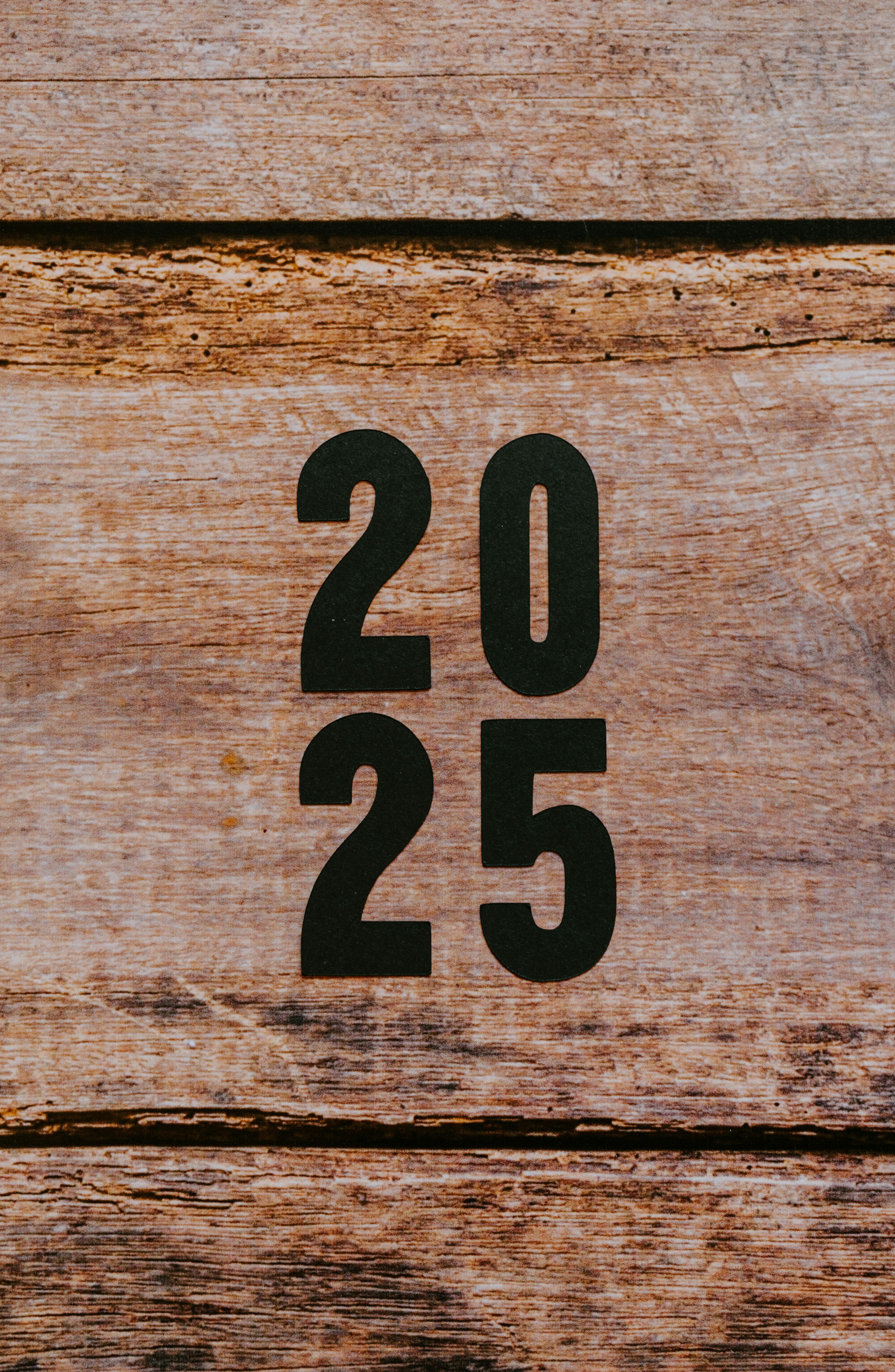 A close up of a number on a wooden surface