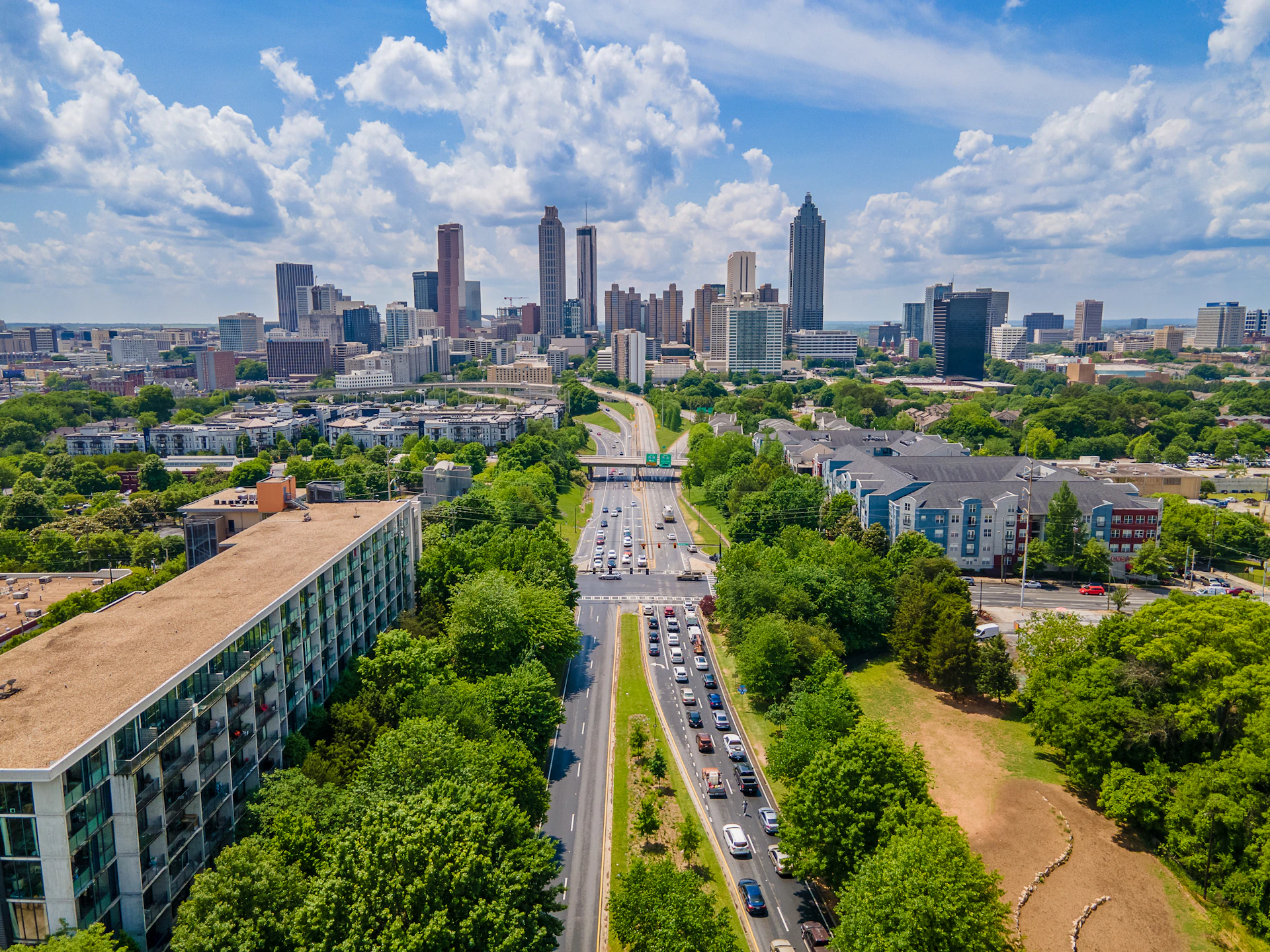 An aerial view of a city with tall buildings