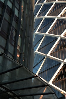 A close up of a very tall building with many windows
