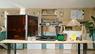 A table with a computer on top of it