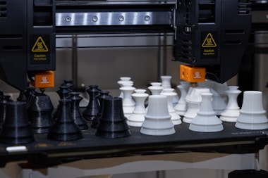 A black and white chess set on a table