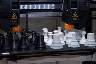 A black and white chess set on a table