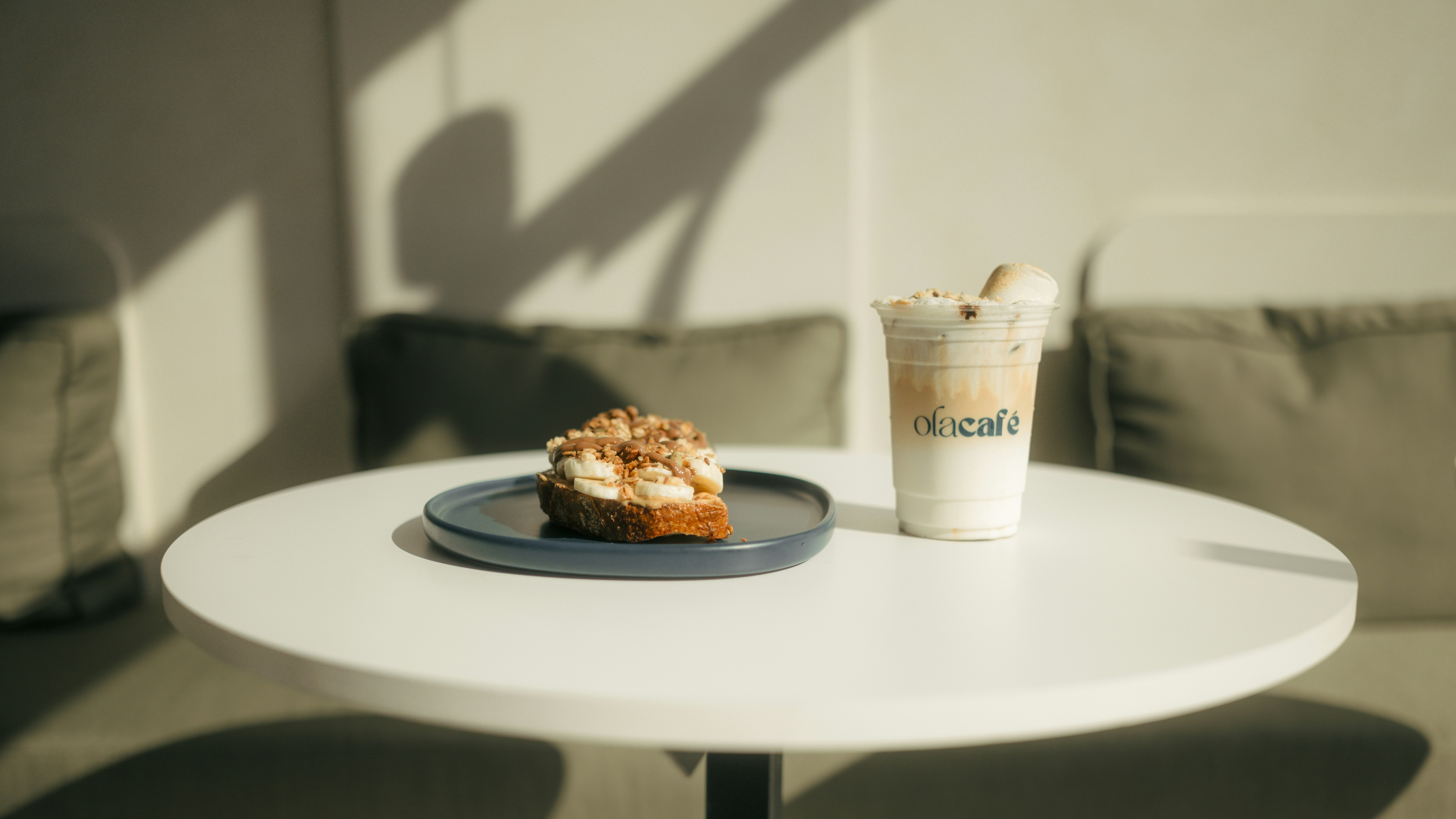 A plate of food sitting on top of a white table