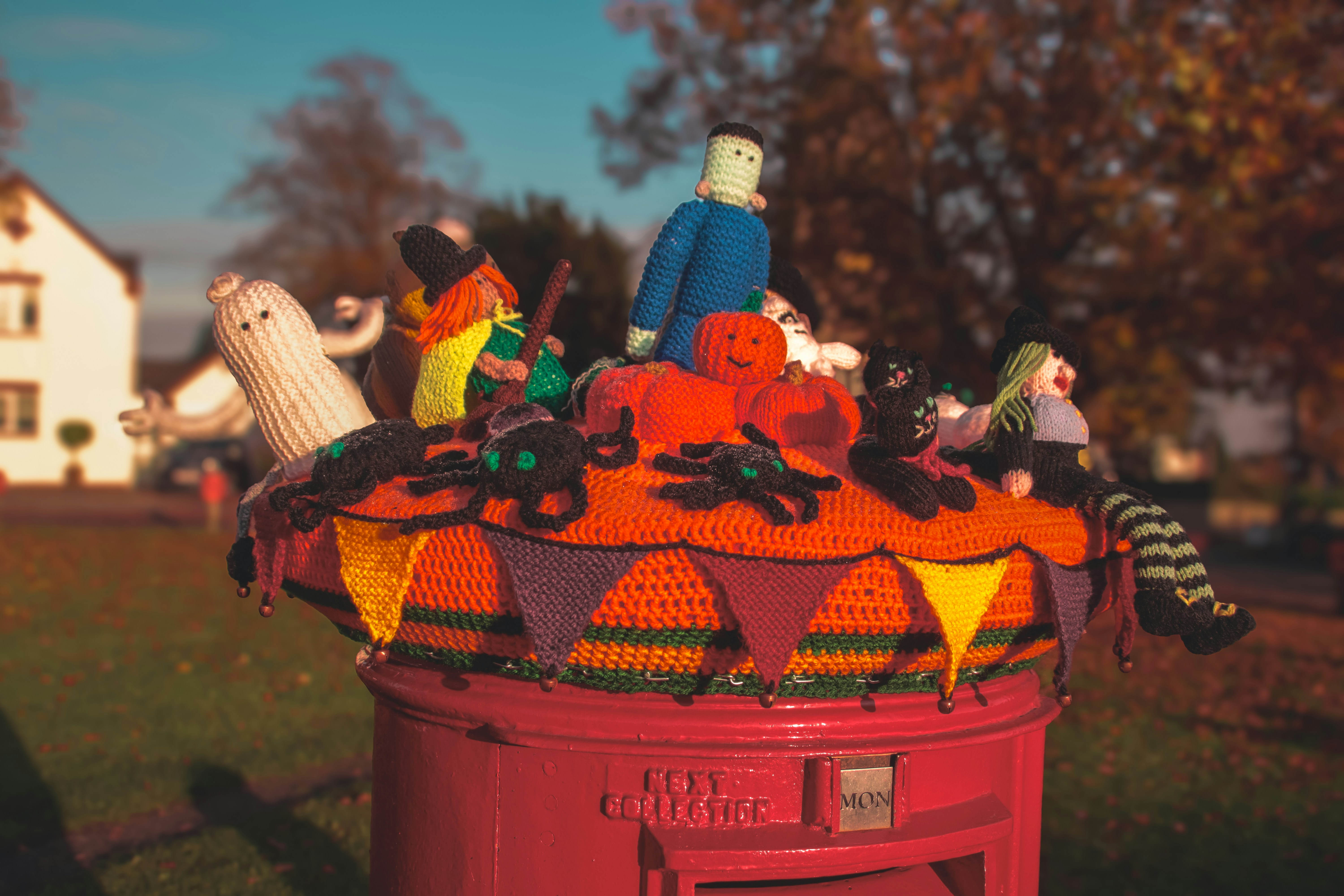 A toy carousel in the middle of a yard